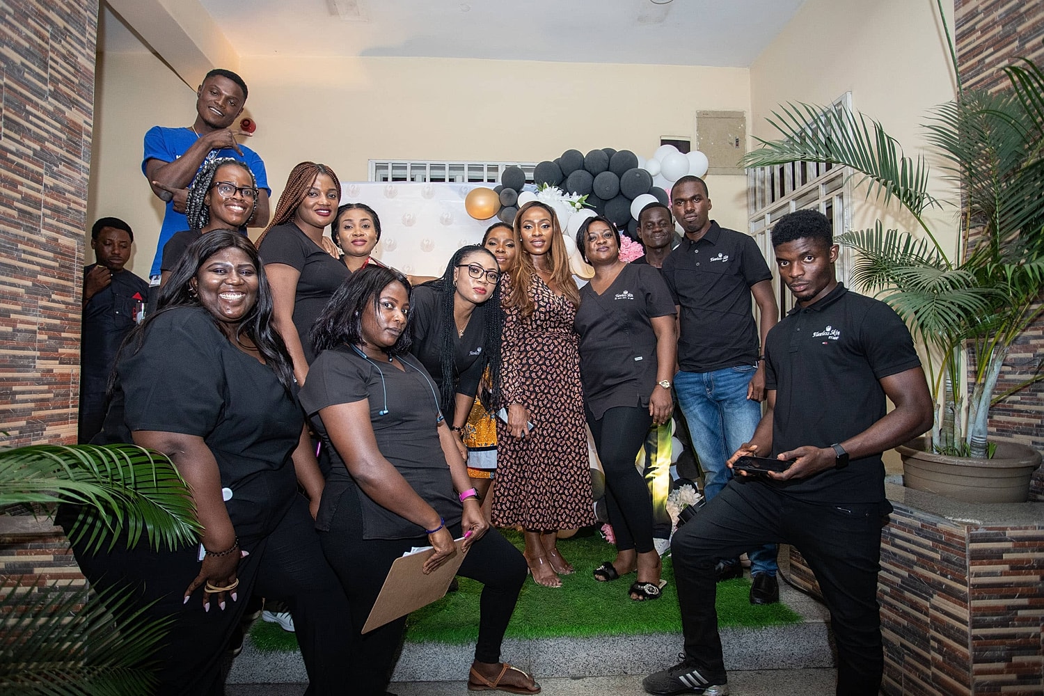 Group photo at an event, smiling participants.