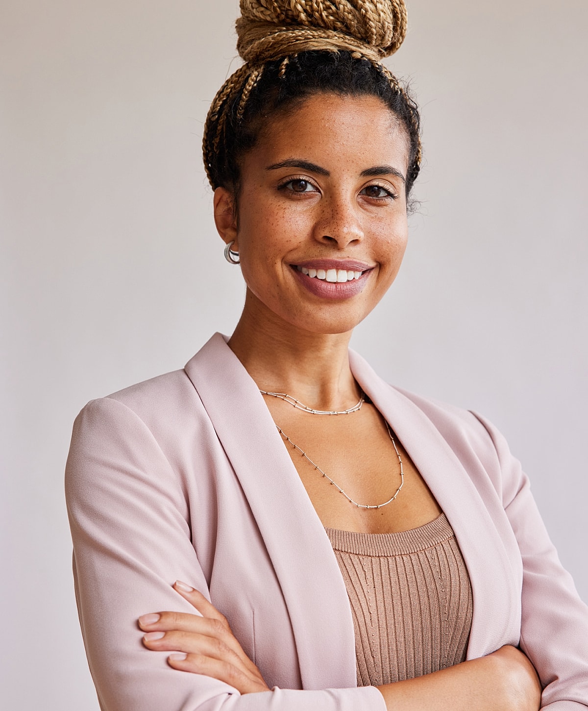 Abuja PDO Thread Lift model with curly hair and natural makeup.