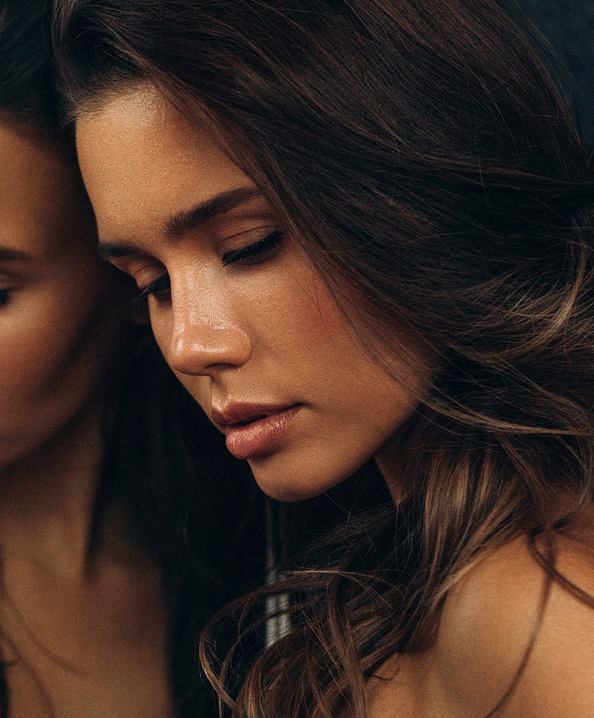 Abuja Facelift model with long silver hair.