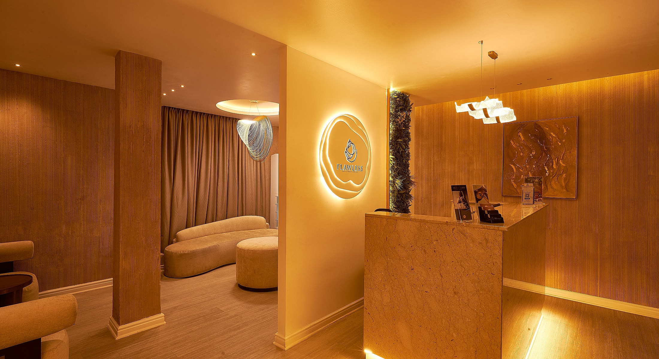 Elegant spa reception with warm lighting and decor.